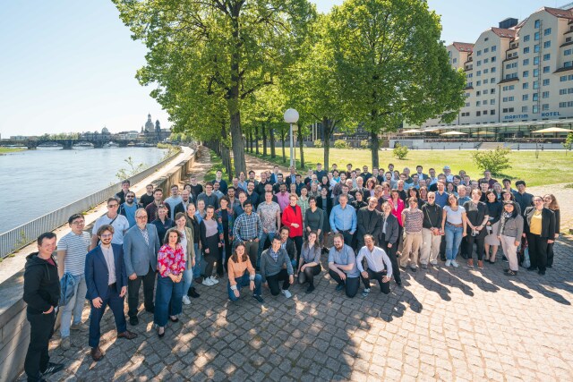 Group photo of CeTI members, in the background the city of Dresden