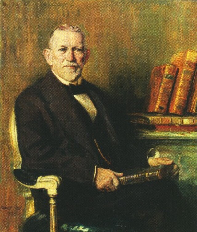 Painting of Hubert Ermisch in an armchair next to books.