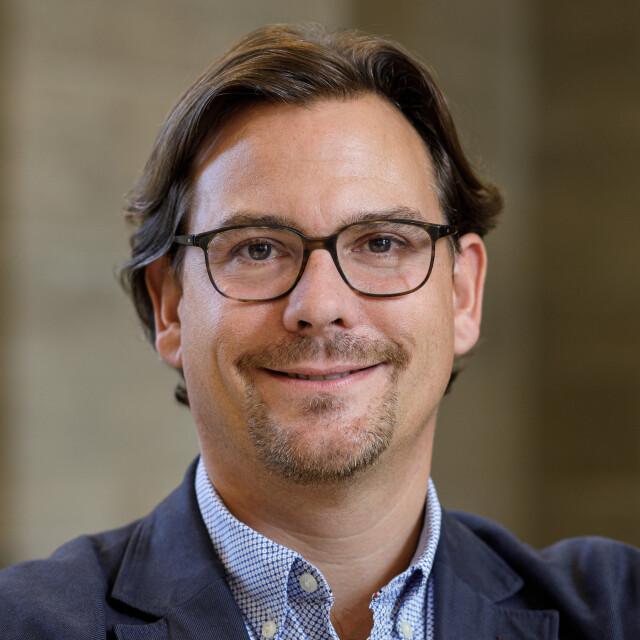 The photo shows a portrait of Christian Leßmann.