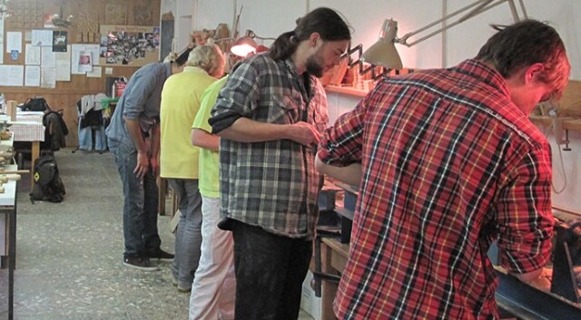 View into a workshop where some people are working