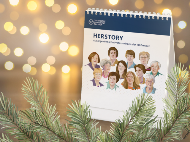  Desk calendar in front of a gold background. A stripe in TUD blue with the university logo runs across the top of the title page. Below that, the title “HERSTORY - Extraordinary Women Professors at TU Dresden” and 12 illustrations showing women.