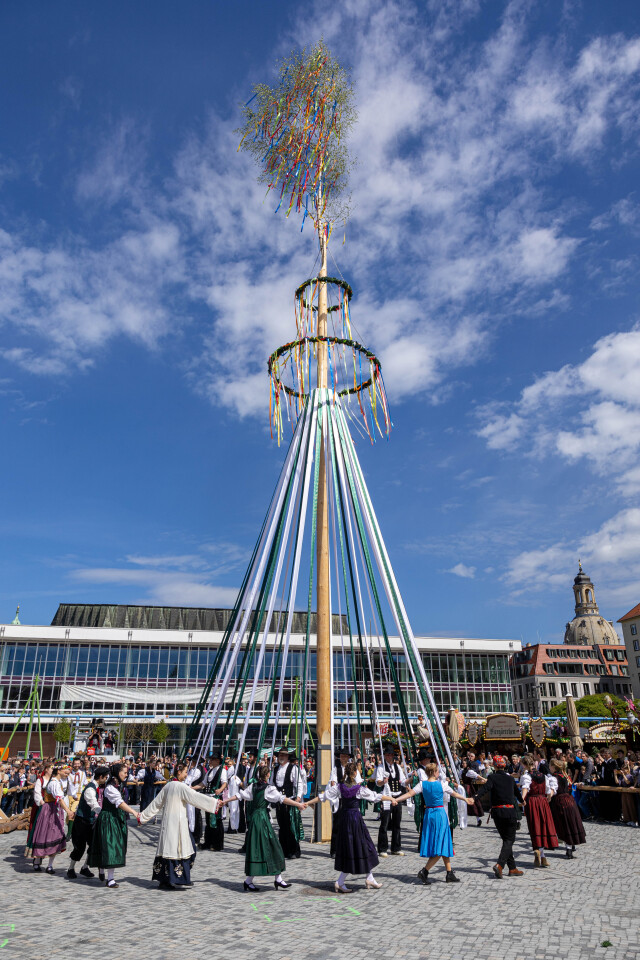 Dancers celebrate the start of spring with the traditional maypole dance.