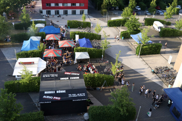 View of the event area with stage and stalls from the apartment tower